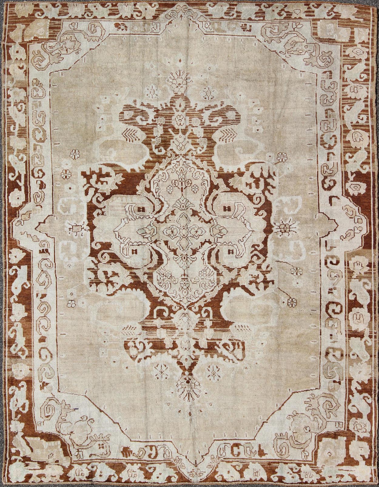 Vintage Turkish Kars Carpet with Floral Medallion in Sienna, Mocha and Bone This incredible vintage Kars carpet beautifully illustrates the imaginative artistry of eastern Turkish weavers. A large and bold sweeping floral medallion takes center ... - Keivan Woven ArtsTU - ARS - 474 - 2460Rug
