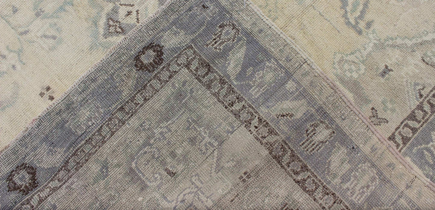 Vintage Turkish Medallion Oushak in Muted Yellow, Blue, Green, Peach & Lilac Vintage Turkish Medallion Oushak in Muted Yellow, Blue, light Green, Peach & Lilac; Country of Origin: Turkey; Type: Oushak; Design: Medallion, Floral Medallion, All - O... - Keivan Woven ArtsTU - DUR - 3415 - 6151Rug