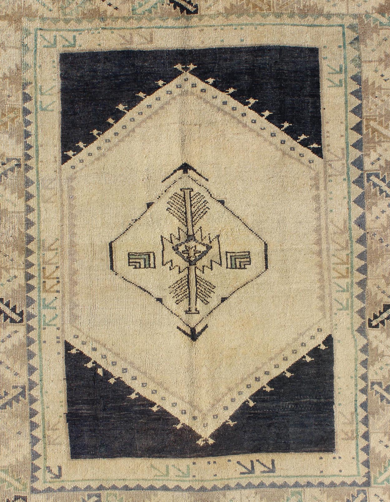 Vintage Turkish Oushak Rug with Central Medallion in Cream and Blue This beautiful rug from mid - 20th century is on a cream ground and home to the center medallion. Three ornate borders with arrows and variegated leaf patterns coordinate wit... - Keivan Woven ArtsTU - DUR - 3691 - 7899Rug