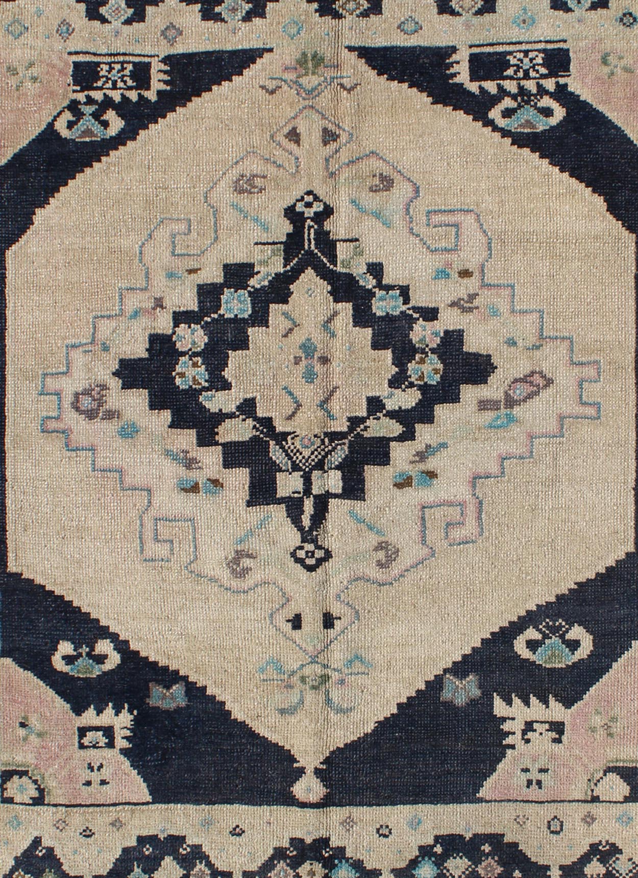 Vintage Hand Knotted Turkish Oushak Rug with Central Medallion in Cream and Blue This beautiful rug from mid - 20th century Turkey features a medallion with floral motifs surrounding it. The cream ground is home to the center medallion. Four dark ... - Keivan Woven ArtsTU - DUR - 3693 - 7903Rug