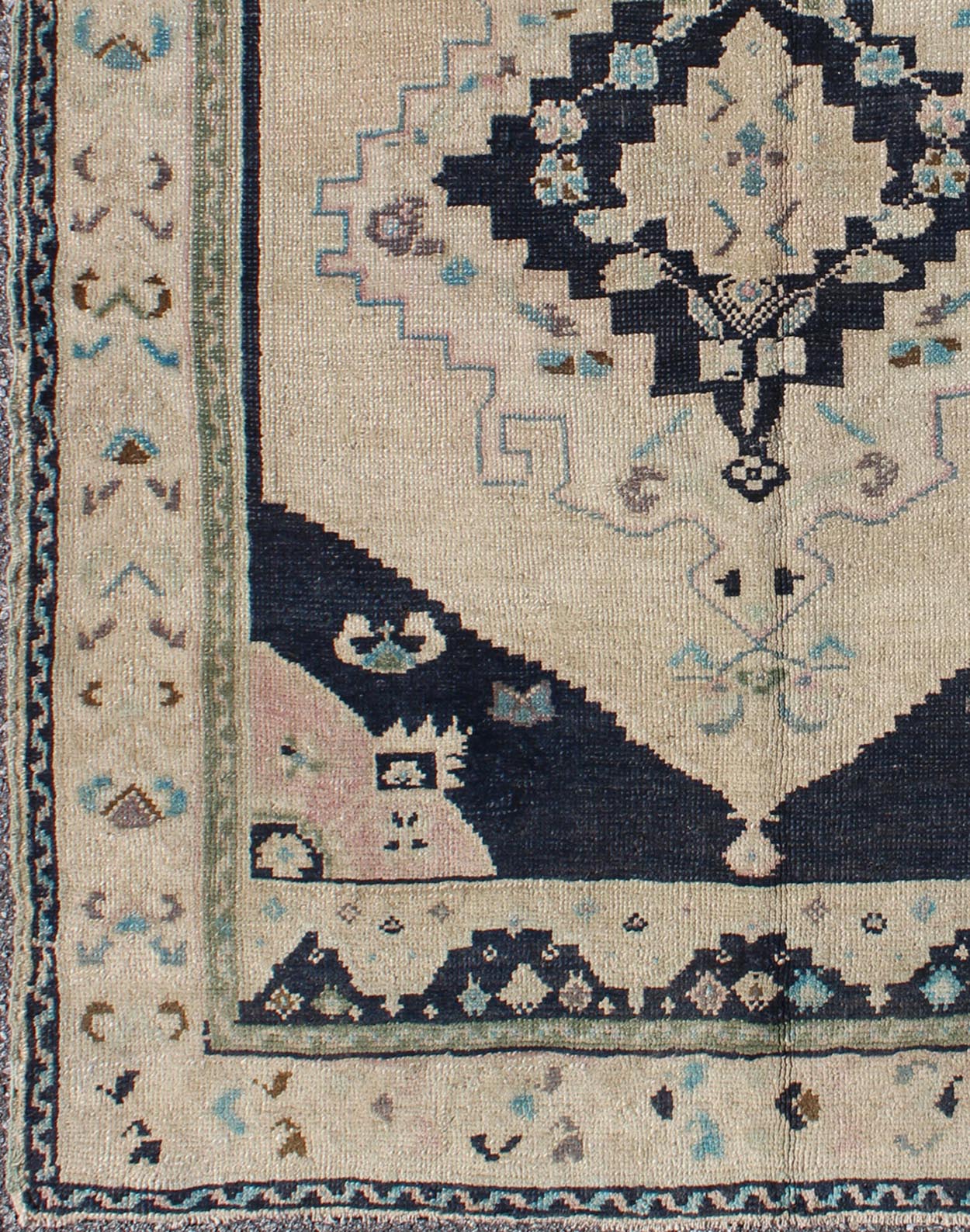 Vintage Hand Knotted Turkish Oushak Rug with Central Medallion in Cream and Blue This beautiful rug from mid - 20th century Turkey features a medallion with floral motifs surrounding it. The cream ground is home to the center medallion. Four dark ... - Keivan Woven ArtsTU - DUR - 3693 - 7903Rug