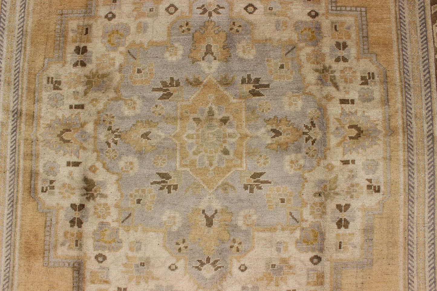 Vintage Turkish Medallion Oushak Rug in Gold, Taupe, Cream and Cocoa Measures: 6'8 x 12 This vintage Turkish Oushak features a bold design softened by unique, light tones. The border is chocolate brown and contains vines and flowers. Co... - Keivan Woven ArtsTU - DUR - 507 - 3508Rug