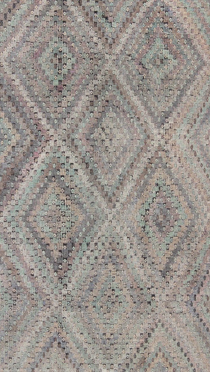 Vintage Jajeem Flat - Weave Rug - This unique Jajeem features a multitude of diamond shapes in the background combined with a simple outer border. The seemingly random use of pastel colors such as gray, light green, light yellow, brown, cream and lavender... - Keivan Woven ArtsTU - EMD - 95008 - 3469Rug
