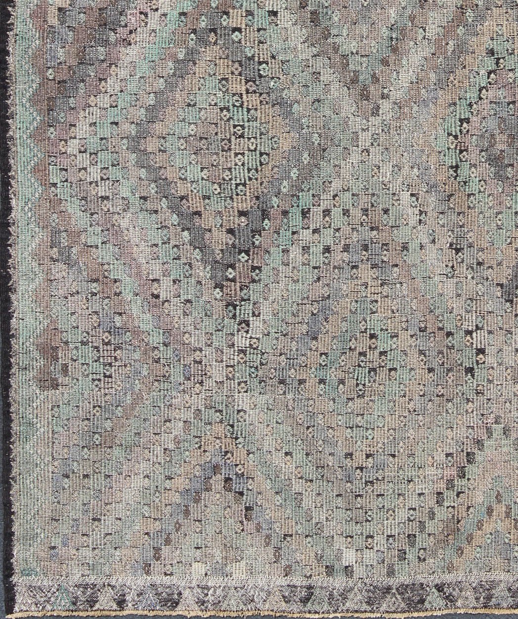 Vintage Jajeem Flat - Weave Rug - This unique Jajeem features a multitude of diamond shapes in the background combined with a simple outer border. The seemingly random use of pastel colors such as gray, light green, light yellow, brown, cream and lavender... - Keivan Woven ArtsTU - EMD - 95008 - 3469Rug