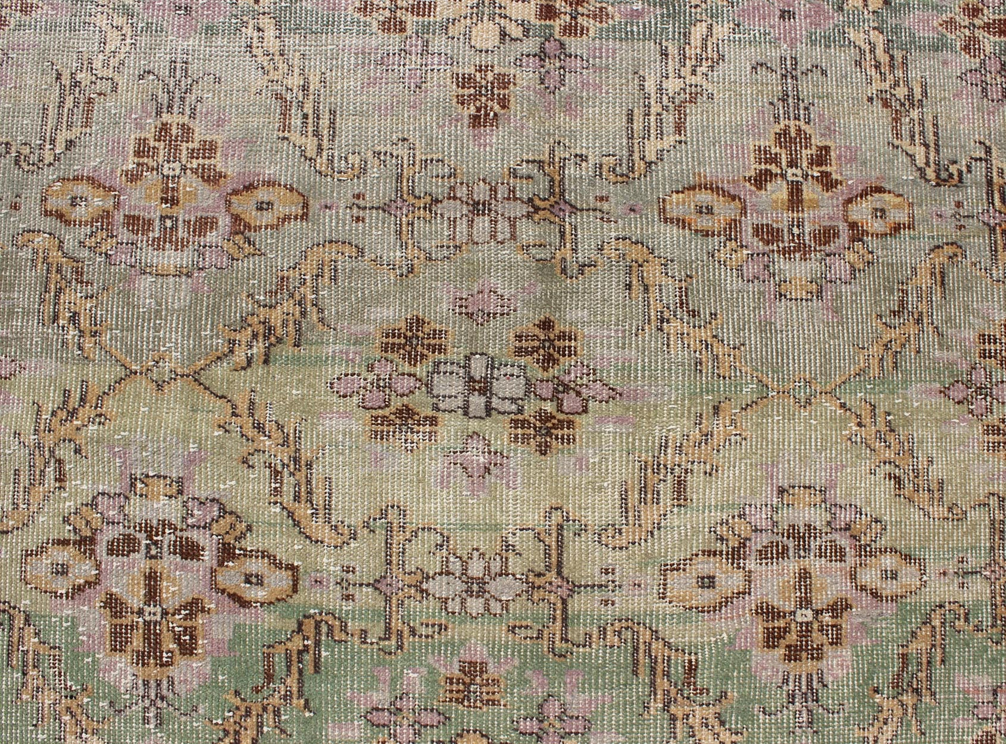 Distressed Vintage Turkish Art Deco Rug with All - Over Vining Flowers Design in Green And Lavender by Keivan Woven Arts/ rug/ TU - ERD - 4574, country of origin / type: Turkey / Art Deco, circa mid - 20th century Measures: 3'10 x 6'9. Alive with... - Keivan Woven ArtsTU - ERD - 4574 - 4942Rug