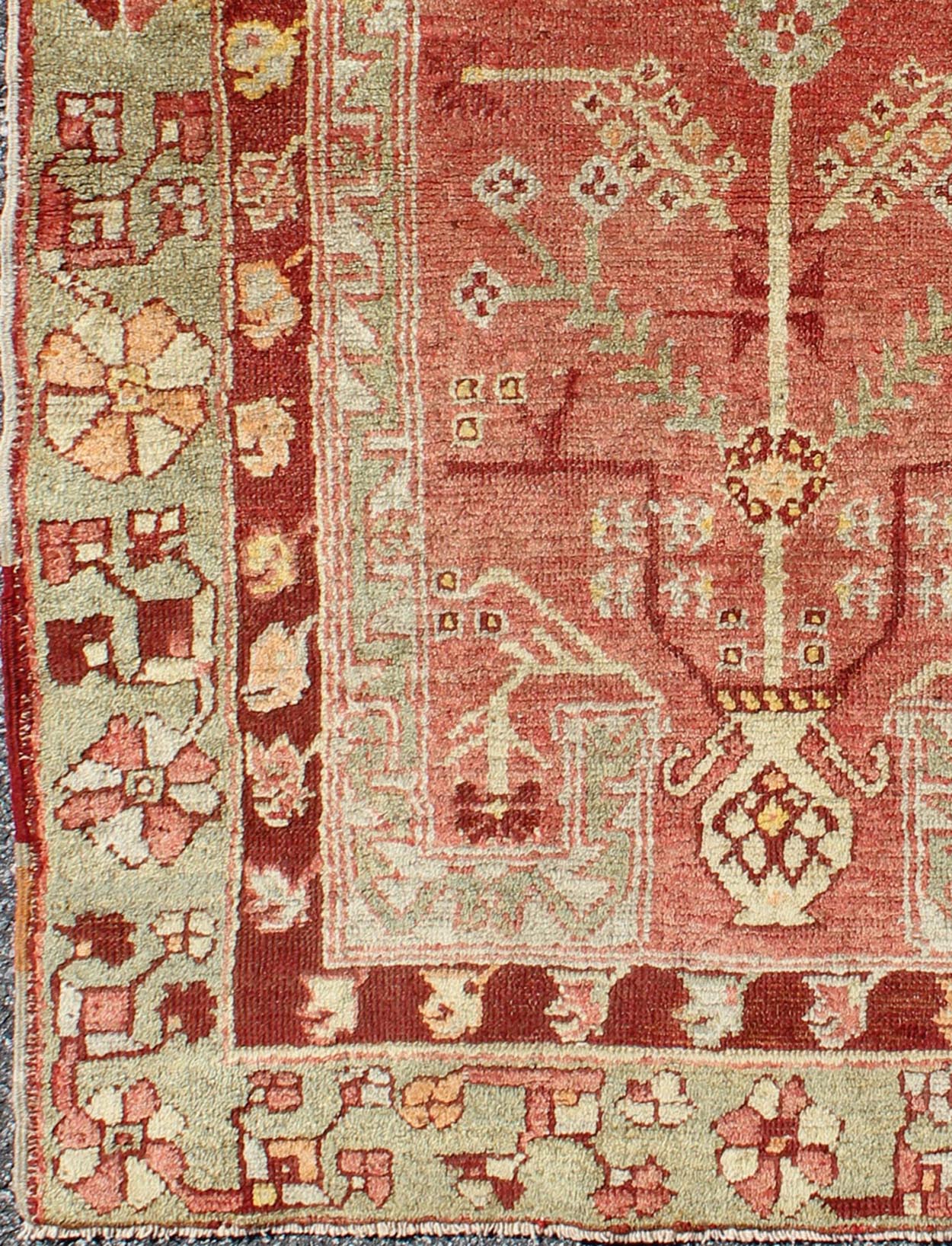 Antique Oushak Rug From Turkey With Directional Tribal Motifs in Soft Rose Red, Green. Antique Oushak Rug Turkey with Tree and Stems, geometric border & Tribal Motifs Keivan Woven Arts/rug/TU - EYP - 1, origin/Turkey, Circa, 1910's Measures... - Keivan Woven ArtsTU - EYP - 1 - 2105Rug