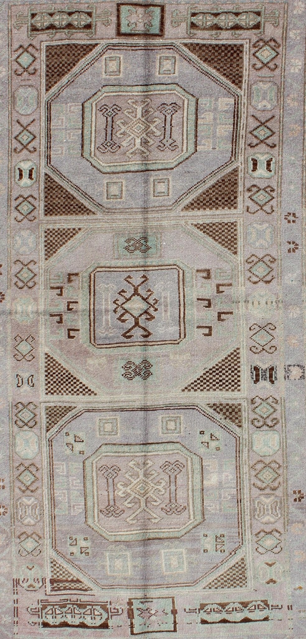 Lavender and teal vintage Turkish Oushak rug with tribal / geometric medallions. Keivan Woven Arts / rug TU - IHS - 95156, country of origin type: Turkey Oushak, circa mid - 20th century The lavender background of this vintage Oushak rug from Turkey (... - Keivan Woven ArtsTU - IHS - 95156 - 4554Rug