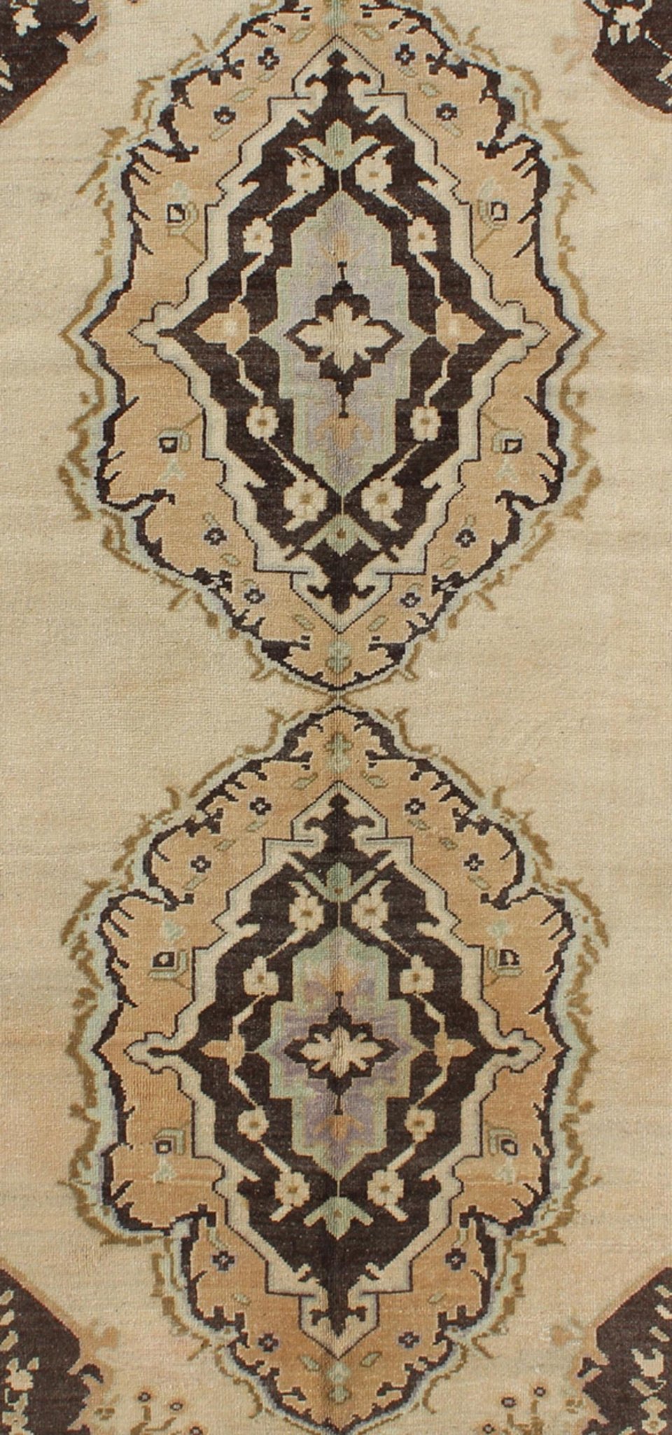 Vintage Turkish Oushak Gallery Rug with Two Medallions in Taupe, Brown and Cream Measures: 4'11 x 10'4. This beautiful vintage Oushak gallery rug from mid - 20th century Turkey features a Classic Oushak design. The faint sand ground is ho... - Keivan Woven ArtsTU - ISA - 3363 - 5744Rug