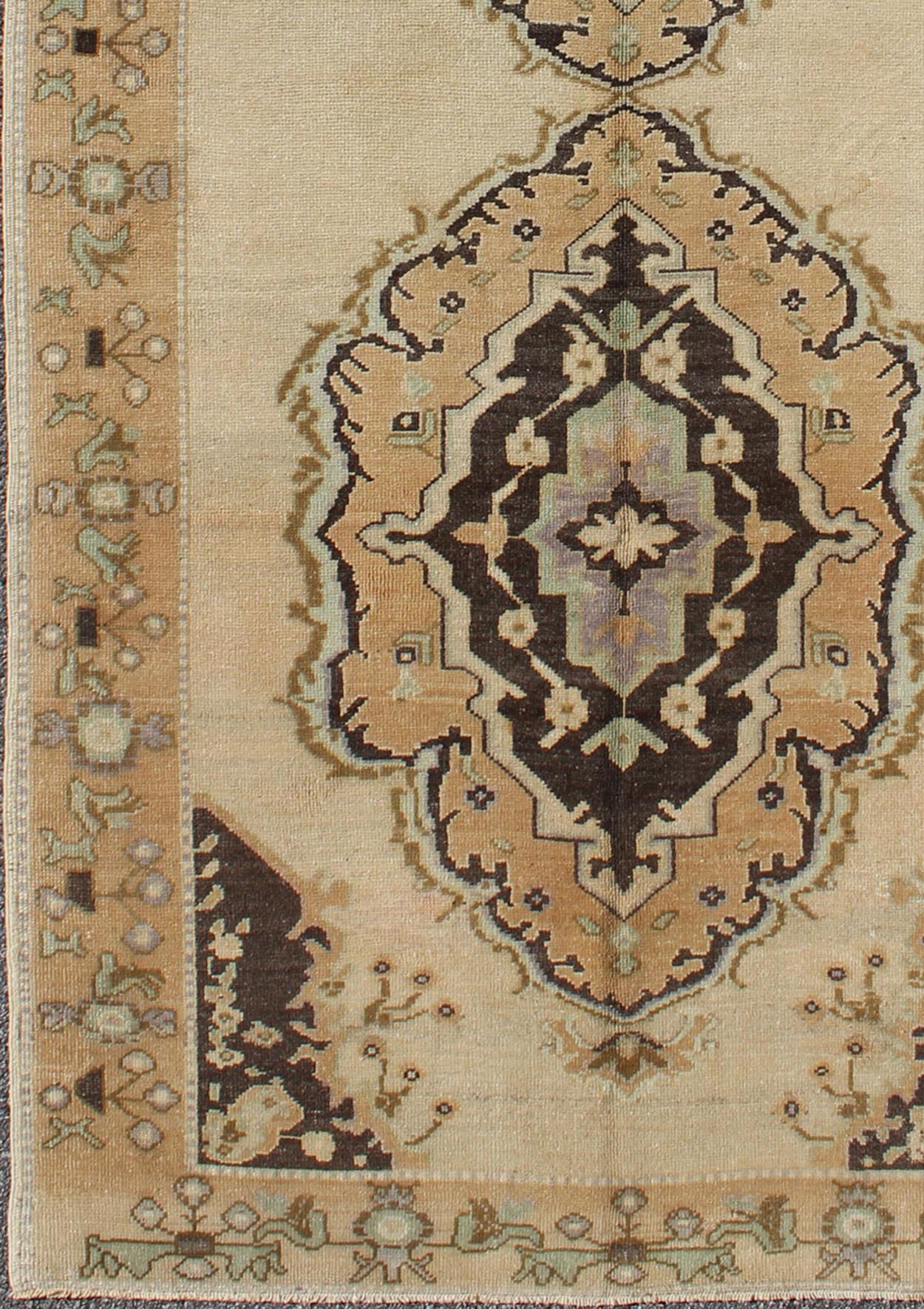Vintage Turkish Oushak Gallery Rug with Two Medallions in Taupe, Brown and Cream Measures: 4'11 x 10'4. This beautiful vintage Oushak gallery rug from mid - 20th century Turkey features a Classic Oushak design. The faint sand ground is ho... - Keivan Woven ArtsTU - ISA - 3363 - 5744Rug