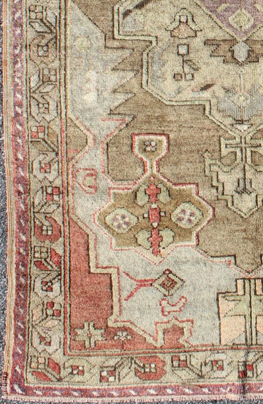 Vintage Turkish Geometric Tribal Medallion Oushak Area Rug In Green With Red Measures 3'9 x 7'6 This vintage Turkish Oushak carpet, circa mid - 20th century features a central, multi - layered medallion design, as well as patterns of smaller ... - Keivan Woven ArtsTU - ISA - 3591 - 6824Rug