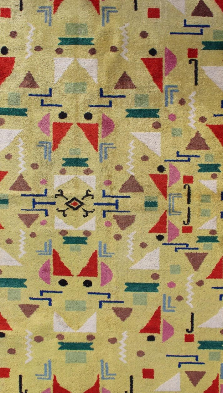 Mid Century Modern Vintage Turkish Rug in Yellow Background and Multi - Colors Measures: 4' x 7'10. Rendered in a yellow background with a spotted and speckled assortment of yellow, red, black, green and blue colors, this very unique Mid - Century r... - Keivan Woven ArtsTU - MTU - 05 - 5319Rug