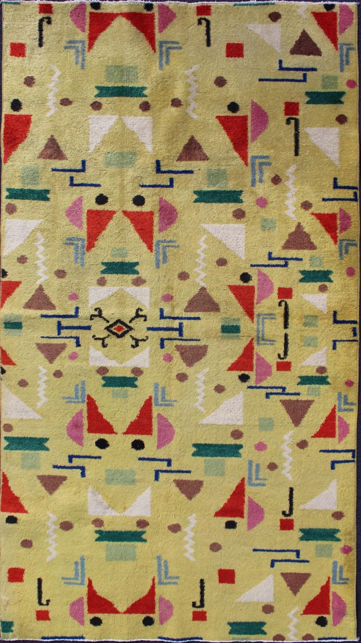 Mid Century Modern Vintage Turkish Rug in Yellow Background and Multi - Colors Measures: 4' x 7'10. Rendered in a yellow background with a spotted and speckled assortment of yellow, red, black, green and blue colors, this very unique Mid - Century r... - Keivan Woven ArtsTU - MTU - 05 - 5319Rug