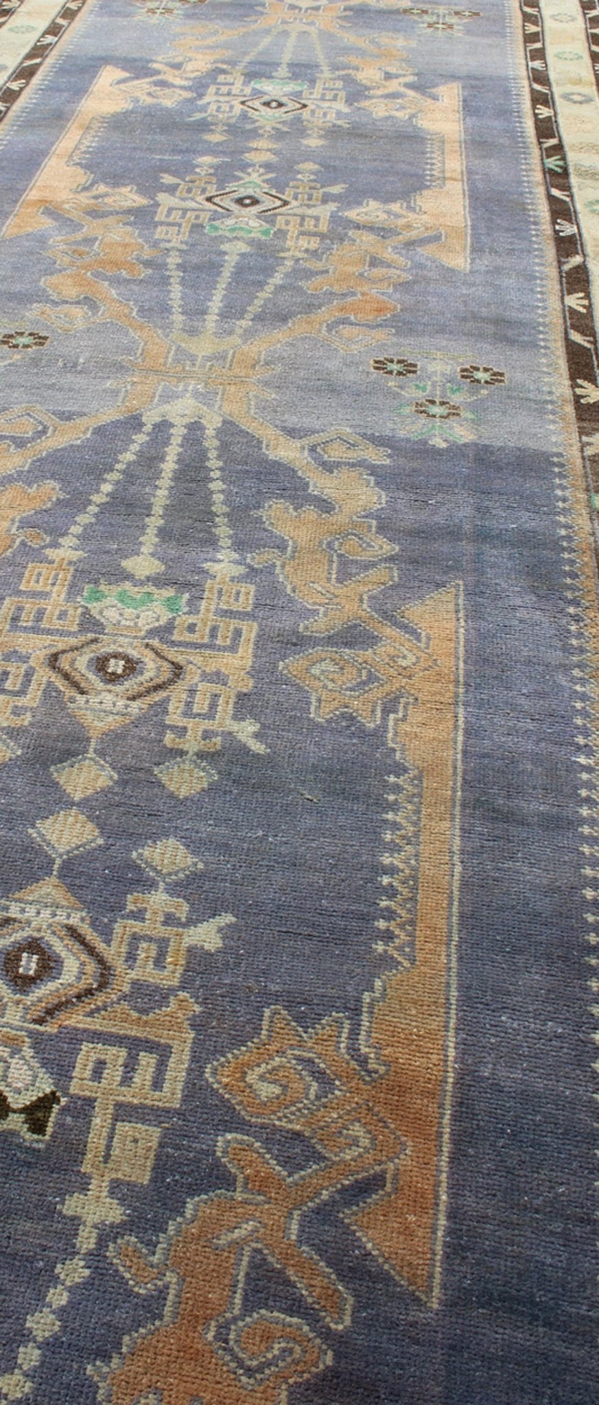 Long Vintage Sivas Runner Bold in design and delicate in colors, this very unique long Turkish Sivas runner rests on a light purple background with three medallions in the center. An ivory main border and two smaller brown guard borders beautifu... - Keivan Woven ArtsTU - MTU - 136064 - 4580Rug
