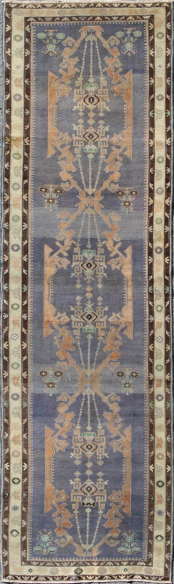 Long Vintage Sivas Runner Bold in design and delicate in colors, this very unique long Turkish Sivas runner rests on a light purple background with three medallions in the center. An ivory main border and two smaller brown guard borders beautifu... - Keivan Woven ArtsTU - MTU - 136064 - 4580Rug