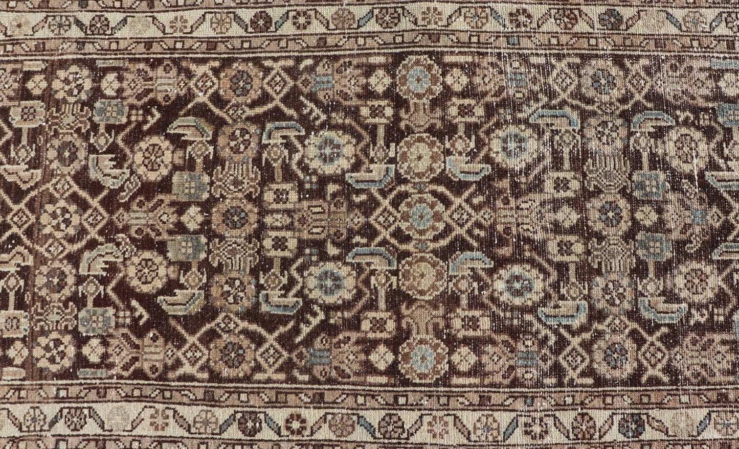 Antique Persian Hamadan Runner in Warm Tones of Gray, Brown, and L. Brown Measures 2'8 x 13'2 This antique Persian runner features a palette of brown, cream, camel, and accents light blue. The all - over, sub - geometric floral covers the en... - Keivan Woven ArtsTU - MTU - 238 - 18764Rug