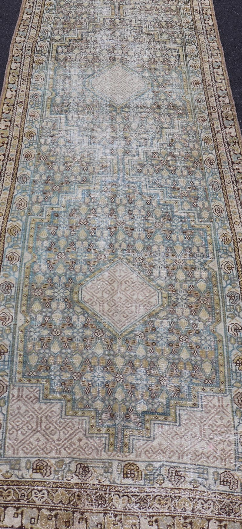 Persian Malayer Runner with Sub Geometric Medallions in Light Blue Field. Keivan Woven Arts / rug/TU - MTU - 2702, country of origin / type: Iran / Malayer, circa 1920 Measures: 3'2 x 16'4 This beautiful antique Malayer runner from Persia features a... - Keivan Woven ArtsTU - MTU - 2702 - 24772Rugs