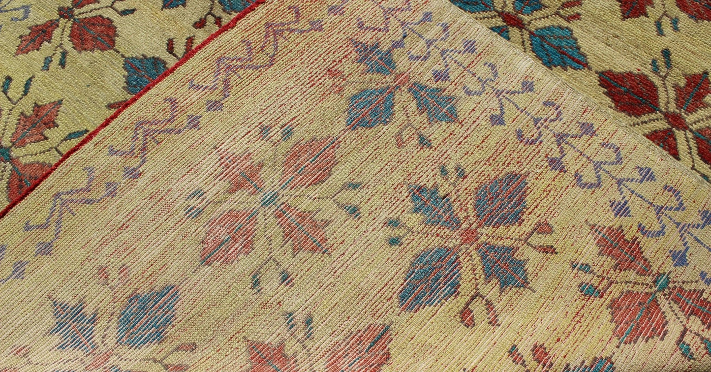 Vintage Turkish Sub - Geometric All - Over Floral Oushak in Yellow, Red, and Blue Measures: 6'5 x 11'5 Set on a pale yellow background, this unique Turkish Oushak rug displays an all - over mid - century modern design. The colors include shades... - Keivan Woven ArtsTU - MTU - 3318 - 5776Rug