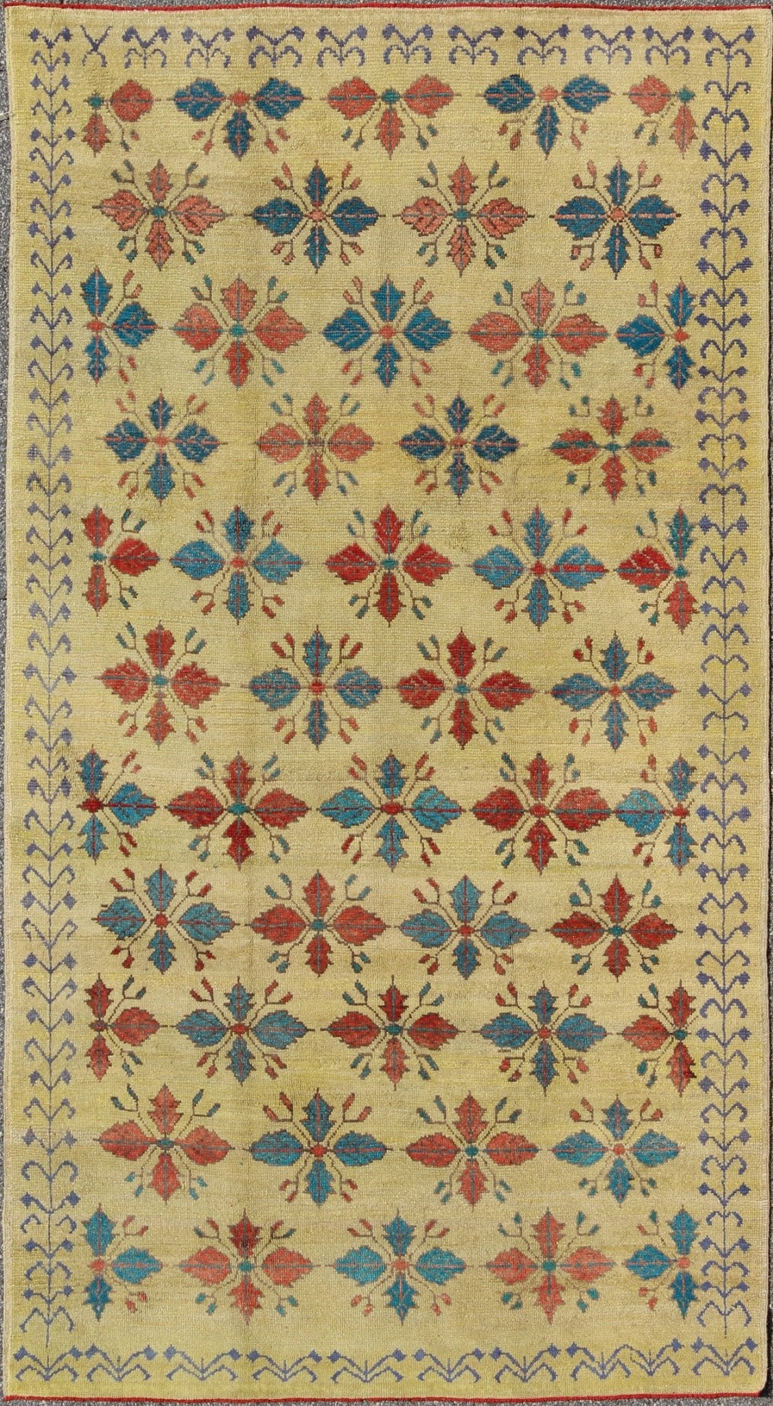 Vintage Turkish Sub - Geometric All - Over Floral Oushak in Yellow, Red, and Blue Measures: 6'5 x 11'5 Set on a pale yellow background, this unique Turkish Oushak rug displays an all - over mid - century modern design. The colors include shades... - Keivan Woven ArtsTU - MTU - 3318 - 5776Rug