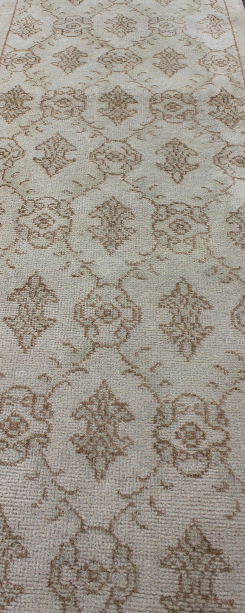 Vintage Turkish Oushak Runner with Light Brown All - Over Latticework Design This vintage Turkish Oushak runner (circa mid - 20th century) features an all - over latticework design with arrowhead figures throughout. The rug's qualities are enhanced by... - Keivan Woven ArtsTU - MTU - 3320 - 5782Rug