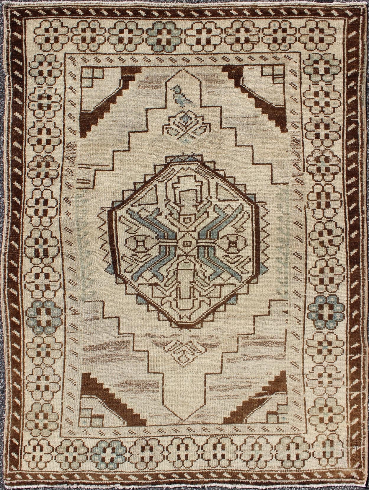 Vintage Oushak Rug from Turkey with Geometric Medallion in Cream and Blue This vintage Oushak rug features an intricately beautiful design. The central medallion is complemented by a gorgeous symmetrical set of stylized geometric - tribal motifs. ... - Keivan Woven ArtsTU - MTU - 3445 - 5830Rug