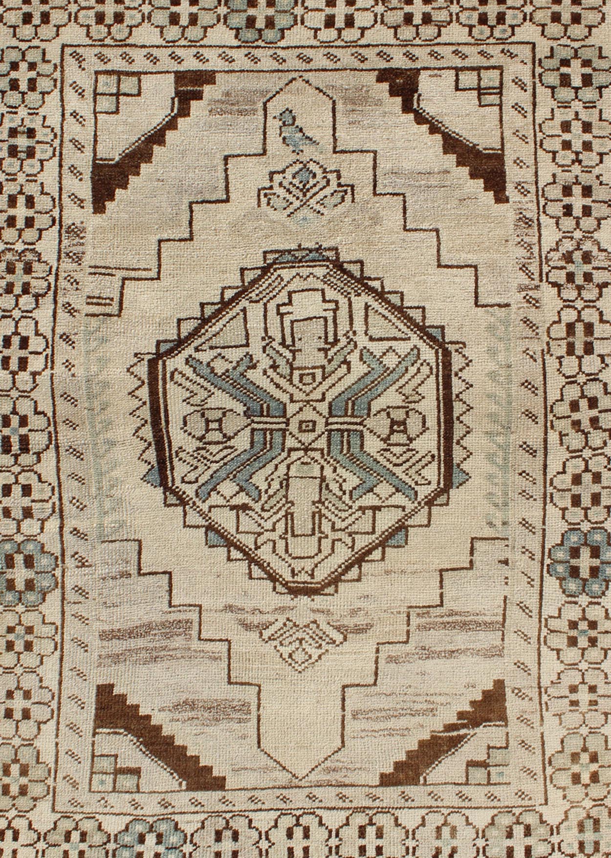 Vintage Oushak Rug from Turkey with Geometric Medallion in Cream and Blue This vintage Oushak rug features an intricately beautiful design. The central medallion is complemented by a gorgeous symmetrical set of stylized geometric - tribal motifs. ... - Keivan Woven ArtsTU - MTU - 3445 - 5830Rug