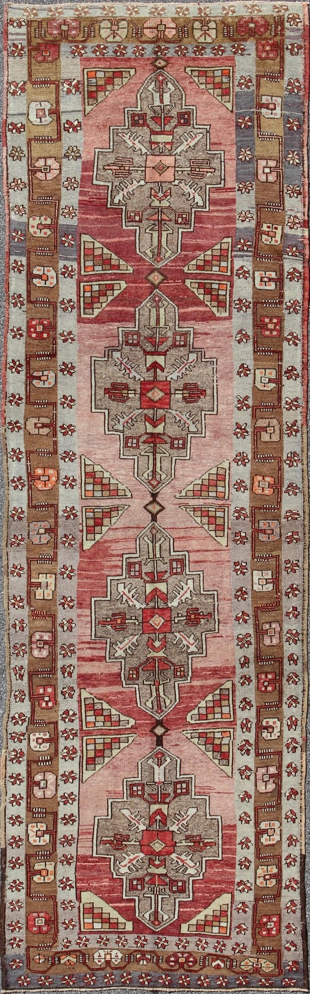 Vintage Turkish Oushak Long Runner with Rose and Pink This vintage Oushak runner contains a unique blend of cheerful colors and an intricately beautiful design. The multi - layered diamond medallions are complemented by a symmetrical set of floral... - Keivan Woven ArtsTU - MTU - 3631 - 6887Rug