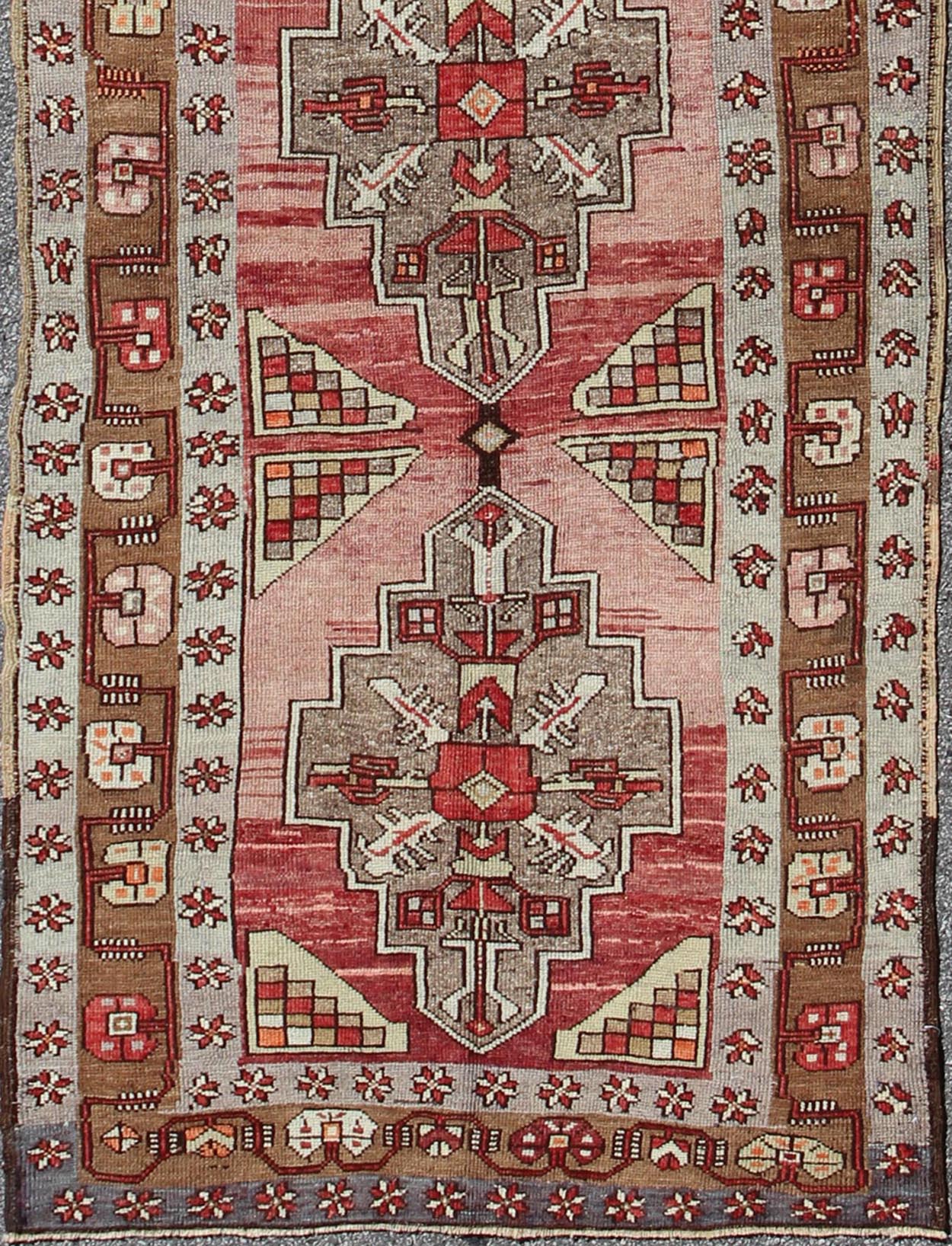 Vintage Turkish Oushak Long Runner with Rose and Pink This vintage Oushak runner contains a unique blend of cheerful colors and an intricately beautiful design. The multi - layered diamond medallions are complemented by a symmetrical set of floral... - Keivan Woven ArtsTU - MTU - 3631 - 6887Rug