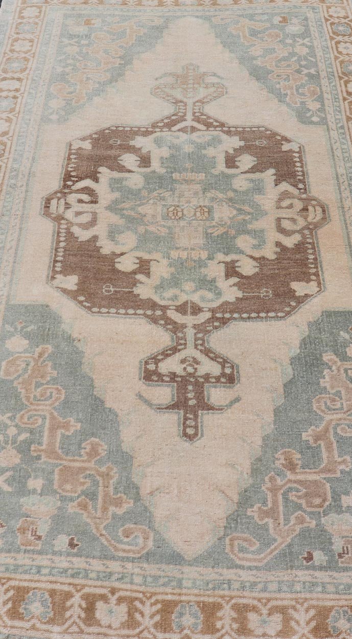 Midcentury Turkish Oushak Rug in Wool with Sub - Geometric Etched Medallion Design This antique Turkish Oushak rug has been hand - knotted in wool and features a sub - geometric etched medallion design rendered in cream, blue and taupe tones. A compl... - Keivan Woven ArtsTU - MTU - 4887 - 18974Rug
