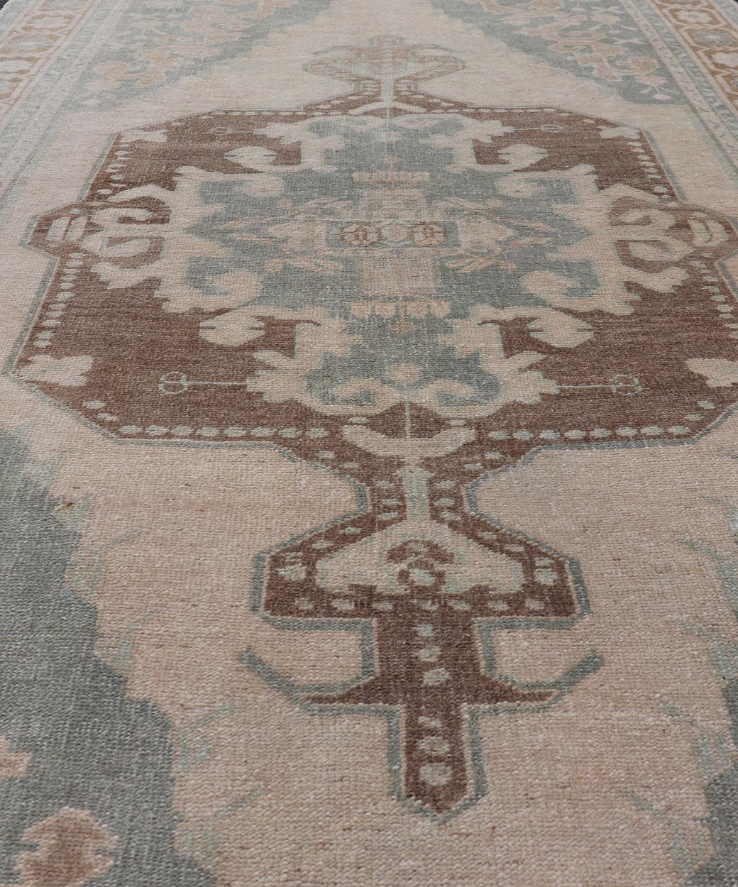 Midcentury Turkish Oushak Rug in Wool with Sub - Geometric Etched Medallion Design This antique Turkish Oushak rug has been hand - knotted in wool and features a sub - geometric etched medallion design rendered in cream, blue and taupe tones. A compl... - Keivan Woven ArtsTU - MTU - 4887 - 18974Rug