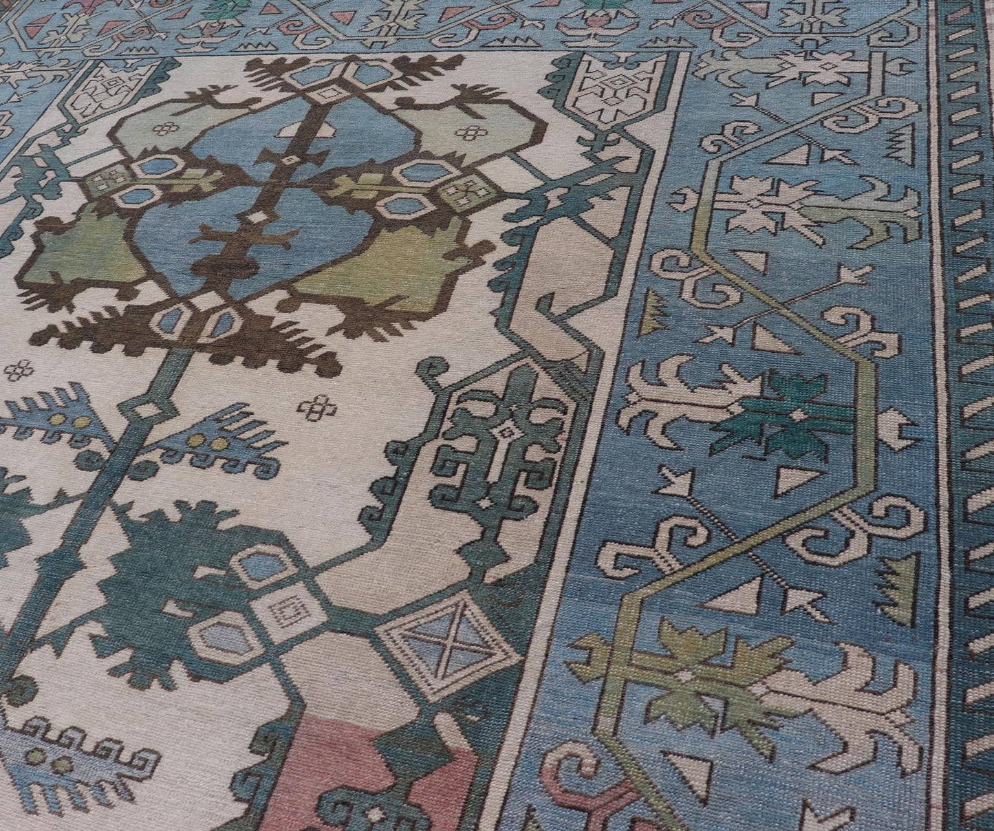 Unique Turkish Rug with Bold Florals in Lt, blue, Lt, Green, Teal & Pink Unusual and Unique Turkish Rug with Bold Florals in Lt, blue, Lt, Green, Teal & Pink, ivory. Keivan Woven Arts rug/TU - MTU - 4960. Set on Ivory background and light blue borde... - Keivan Woven ArtsTU - MTU - 4960 - 19010