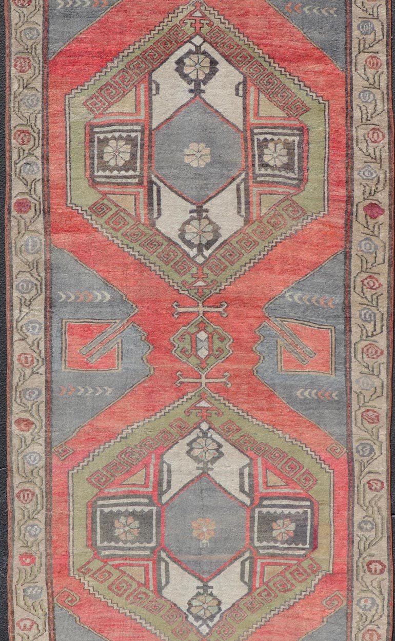 Red Field Vintage Turkish Oushak Gallery Runner with A Geometric Design Red field vintage Turkish Oushak rug with vertical geometric medallions, Keivan Woven Arts / rug TU - MTU - 8 , country of origin / type: Turkey / Oushak, circa 1940 ... - Keivan Woven ArtsTU - MTU - 8 - 18637Rug