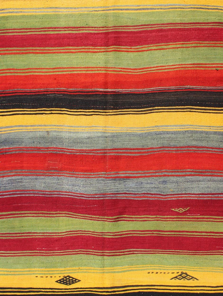 Colorful Vintage Turkish Kilim Rug with Subtle Tribal Shapes and Stripes Design, rug mtu - 95042, country of origin / type: Turkey / Kilim, circa mid - 20th century Featuring a repeating horizontal stripe design, with a few tribal motifs throughout,... - Keivan Woven ArtsTU - MTU - 95042 - 3890Rug