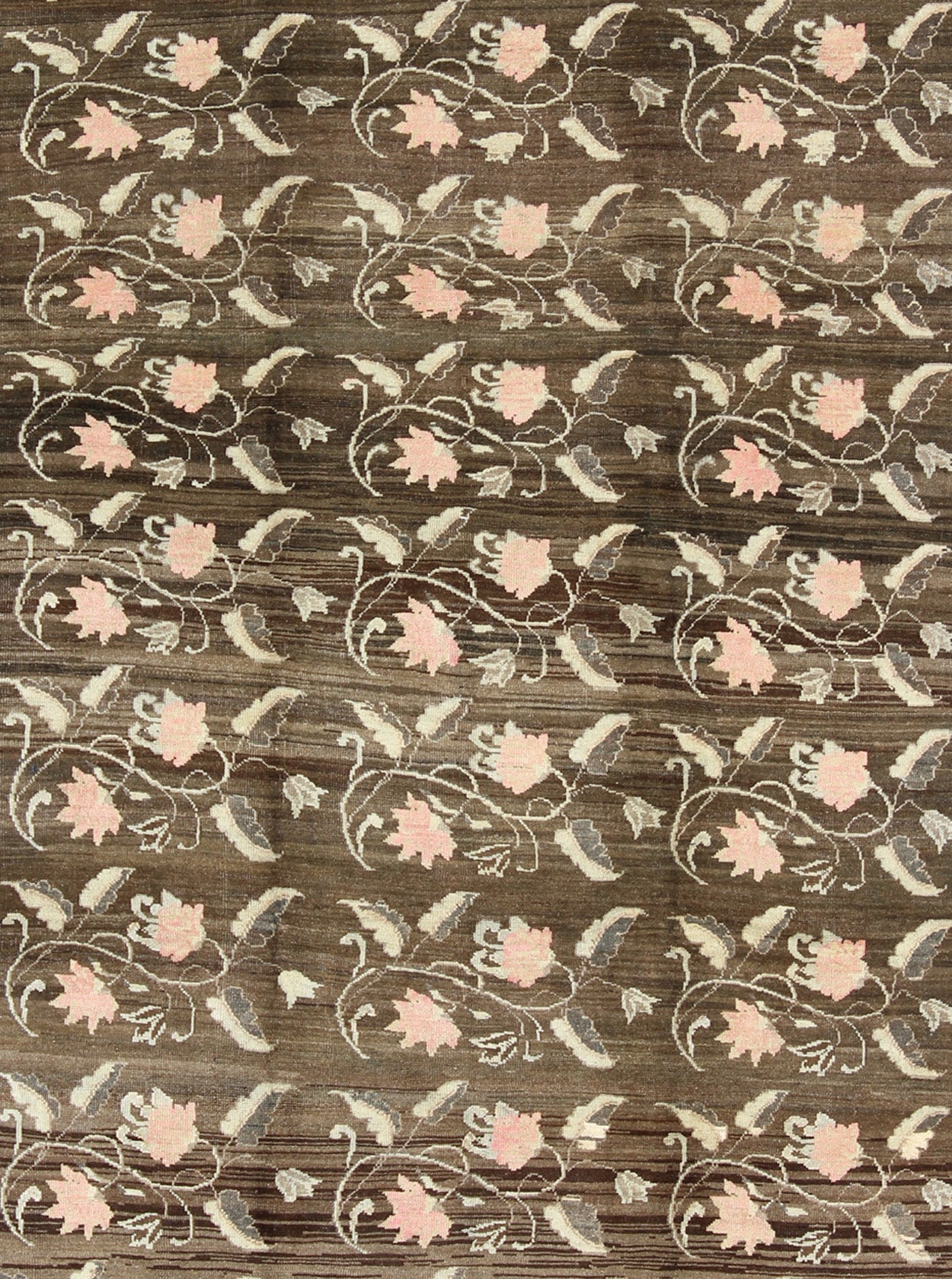 Vintage Kars Rug from Eastern Turkey with Rose Design Brown, Green, and Pink Measures: 7'5 x 11'4 Set on a dark greenish - brown background, the all - encompassing floral pattern of this vintage Turkish Kars is unique. The pale pink and pea... - Keivan Woven ArtsTU - MTU - 95044 - 3904Rug