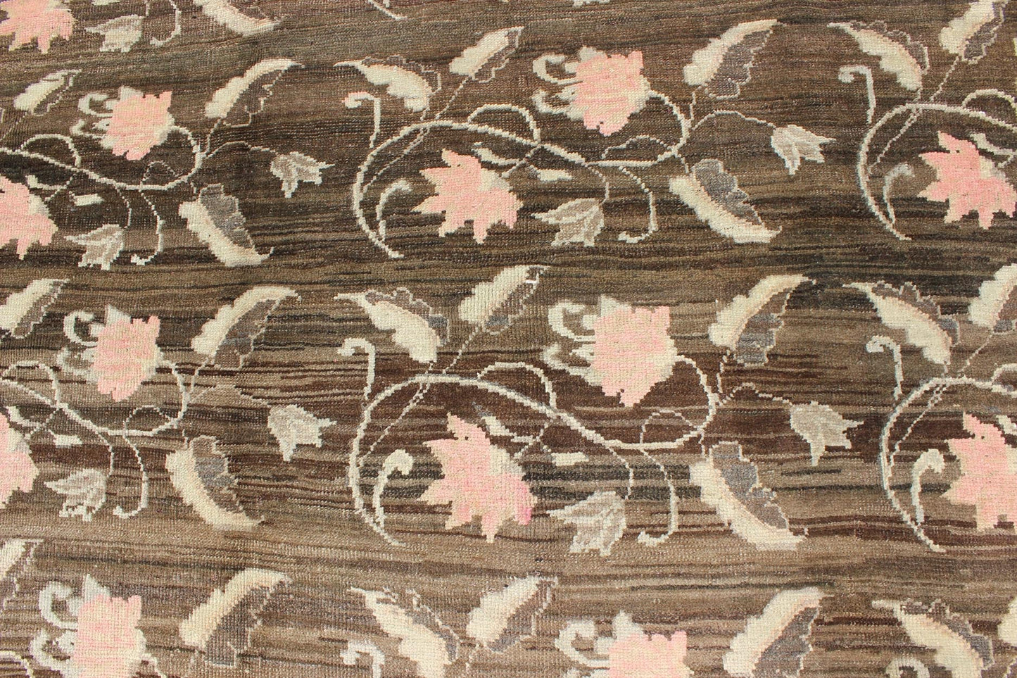 Vintage Kars Rug from Eastern Turkey with Rose Design Brown, Green, and Pink Measures: 7'5 x 11'4 Set on a dark greenish - brown background, the all - encompassing floral pattern of this vintage Turkish Kars is unique. The pale pink and pea... - Keivan Woven ArtsTU - MTU - 95044 - 3904Rug