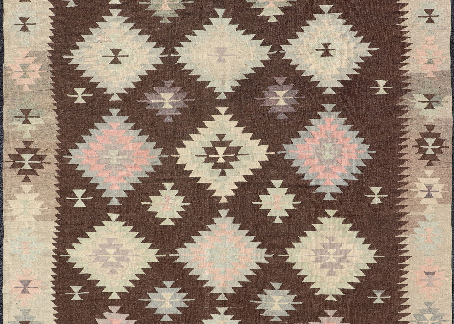 Tribal and Geometrics Turkish Kilim in brown with Cream, Pink, light gray/Blue. Turkish Kilim vintage in dark brown background and cream with graphic tribal design, Keivan Woven Arts rug/TU - NED - 1009, country of origin / type: Turkey / Kilim, ci... - Keivan Woven ArtsTU - NED - 1009 - 14318Rug