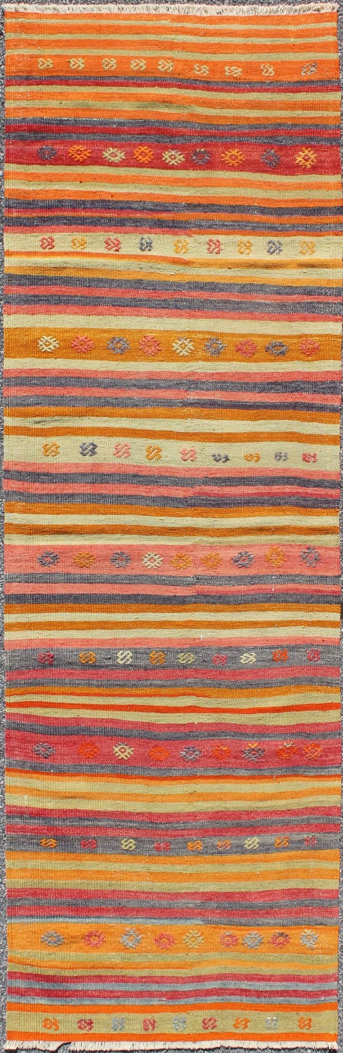 Vintage Turkish Kilim Runner With Geometric Tribal Designs and Colorful Stripes. Keivan Woven Arts / rug TU - NED - 119, country of origin / type: Turkey / Kilim, circa mid - 20th century Measures: 2'10 x 9'2. Featuring tribal shapes rendered in a repe... - Keivan Woven ArtsTU - NED - 119 - 3544Rug