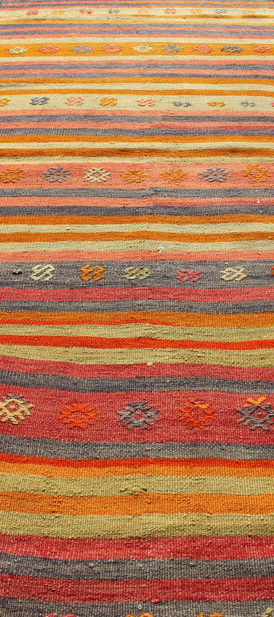 Vintage Turkish Kilim Runner With Geometric Tribal Designs and Colorful Stripes. Keivan Woven Arts / rug TU - NED - 119, country of origin / type: Turkey / Kilim, circa mid - 20th century Measures: 2'10 x 9'2. Featuring tribal shapes rendered in a repe... - Keivan Woven ArtsTU - NED - 119 - 3544