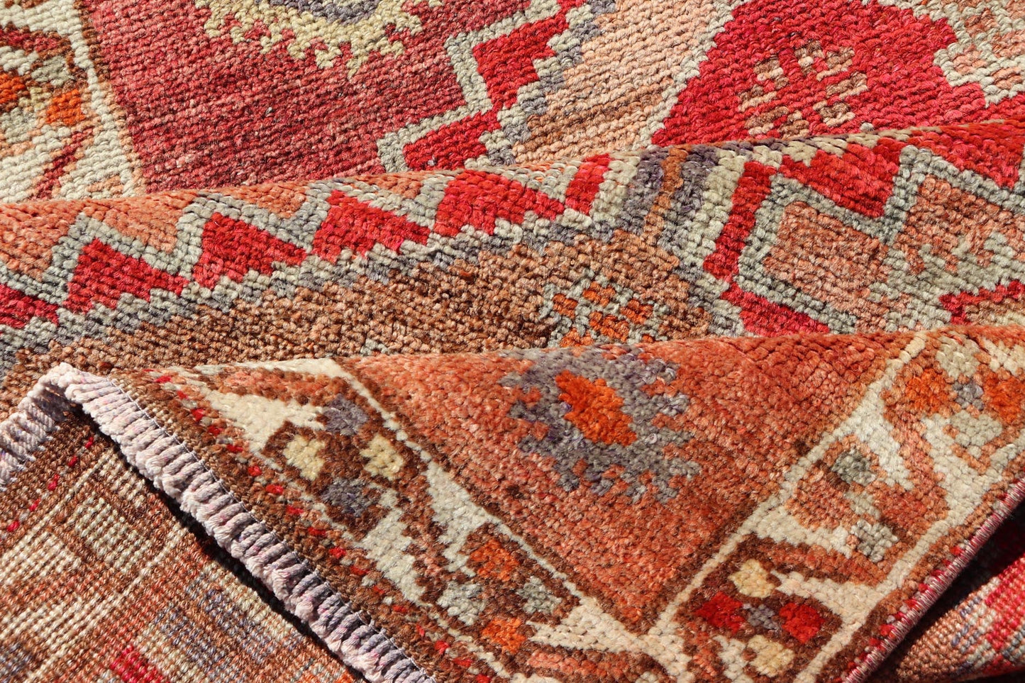 Measures: 2'10 x 11'10 Vintage Turkish Oushak Runner with Tribal Medallions in Redish Tones. Keivan Woven Arts / rug TU - NED - 4688, country of origin / type: Turkey / Oushak, circa 1950. This vintage Oushak runner features a unique blend of cheerfu... - Keivan Woven ArtsTU - NED - 4688 - 22111Rug