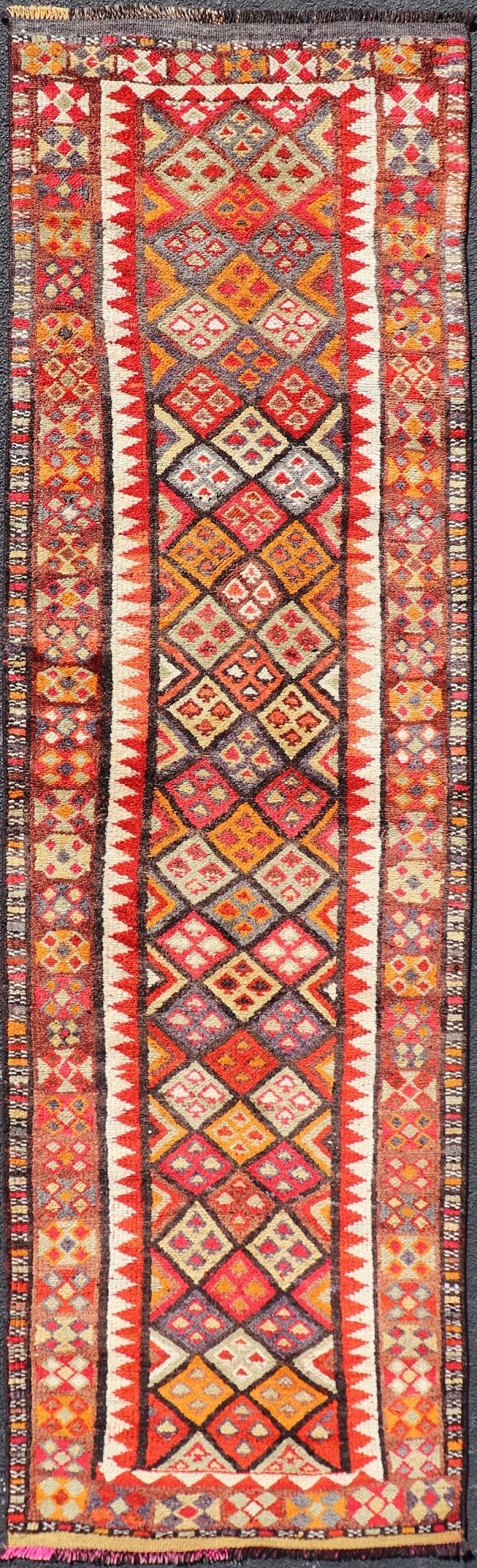 Measures: 2'9 x 9'10 Multicolored Midcentury Turkish Kurdish Oushak Runner with Diamonds and Stars. Keivan Woven Arts / rug TU - NED - 4692, country of origin / type: Iran / Kurdish Oushak, circa 1950 This Kurdish tribal rug was woven by Kurdish wea... - Keivan Woven ArtsTU - NED - 4692 - 22129Rug