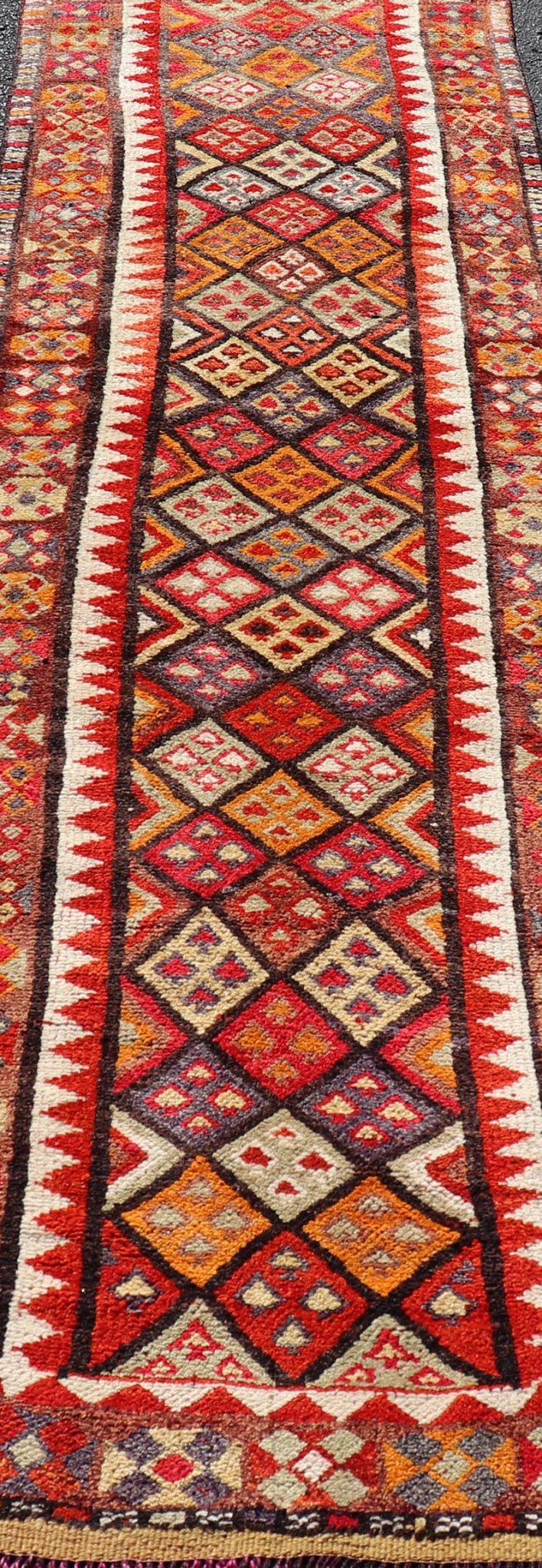 Measures: 2'9 x 9'10 Multicolored Midcentury Turkish Kurdish Oushak Runner with Diamonds and Stars. Keivan Woven Arts / rug TU - NED - 4692, country of origin / type: Iran / Kurdish Oushak, circa 1950 This Kurdish tribal rug was woven by Kurdish wea... - Keivan Woven ArtsTU - NED - 4692 - 22129Rug