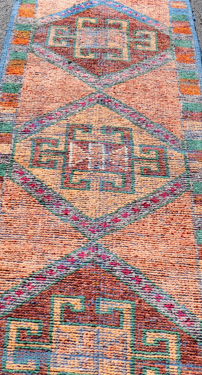 Measures: 2'10 x 9'9 Multicolored Mid - Century Turkish Kurdish Oushak Runner With Large Medallions. Keivan Woven Arts / rug TU - NED - 5020, country of origin / type: Iran / Kurdish Oushak, circa 1960 This Kurdish tribal rug was woven by Kurdish weav... - Keivan Woven ArtsTU - NED - 5020 - 22261Rug