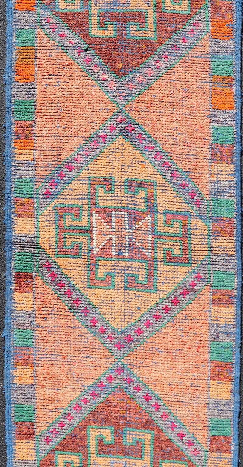 Measures: 2'10 x 9'9 Multicolored Mid - Century Turkish Kurdish Oushak Runner With Large Medallions. Keivan Woven Arts / rug TU - NED - 5020, country of origin / type: Iran / Kurdish Oushak, circa 1960 This Kurdish tribal rug was woven by Kurdish weav... - Keivan Woven ArtsTU - NED - 5020 - 22261Rug