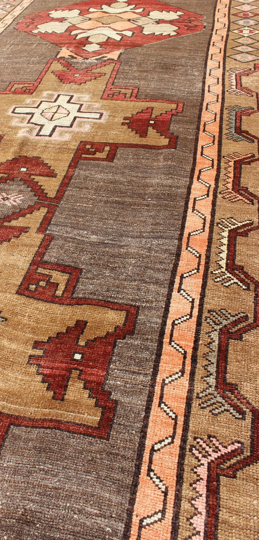 Vintage Turkish Carpet with Vertical Cross Shapes and Geometric Elements Vintage Turkish Carpet with Vertical Cross Shapes and Geometric Elements rug/tu - sim - 25 origin/ turkey kwarugs This vintage Turkish rug features a unique blend of col... - Keivan Woven ArtsTU - SIM - 25 - 3910