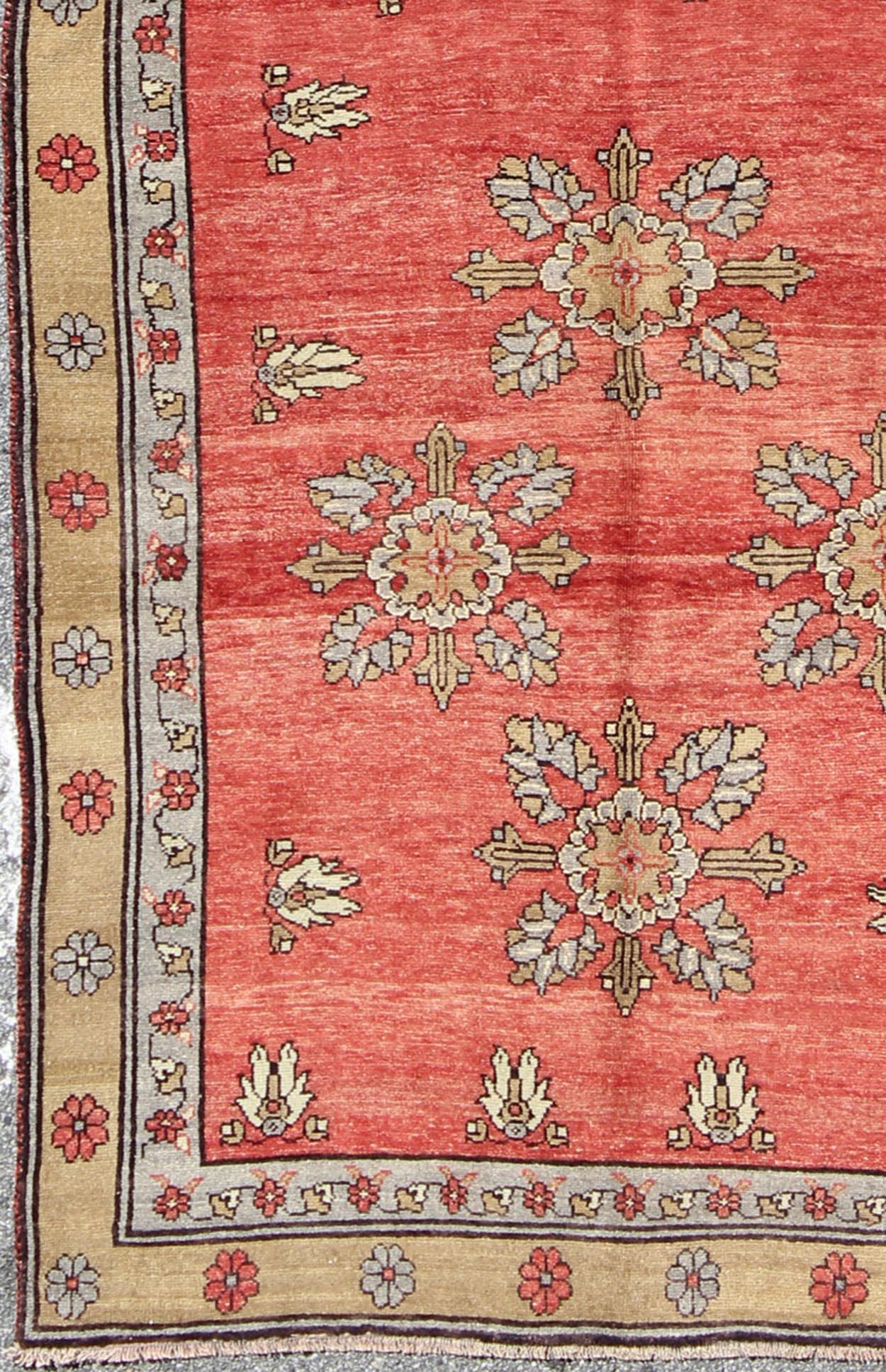Vintage Turkish Oushak Carpet with Flowers in the Central Field and Borders Produced in mid - 20th century Turkey, this vintage Oushak is characterized by a comely and highly representative Oushak composition. Building on traditional designs, this... - Keivan Woven ArtsTU - SIM - 3641 - 6915Rug