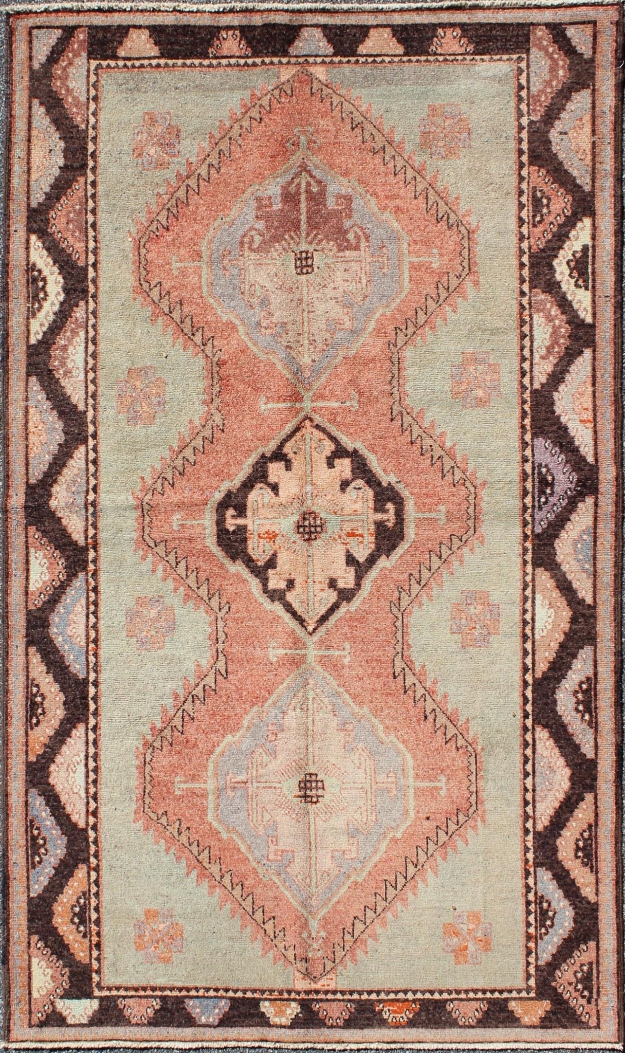 Turkish Oushak Rug This soft color Oushak carpet rests beautifully upon a field of elegant green and tangerine. Three medallions take center stage and are well balanced with a border of cast green, orange and natural brown. This Oushak remains e... - Keivan Woven ArtsTU - TOZ - 136540 - 5032Rug