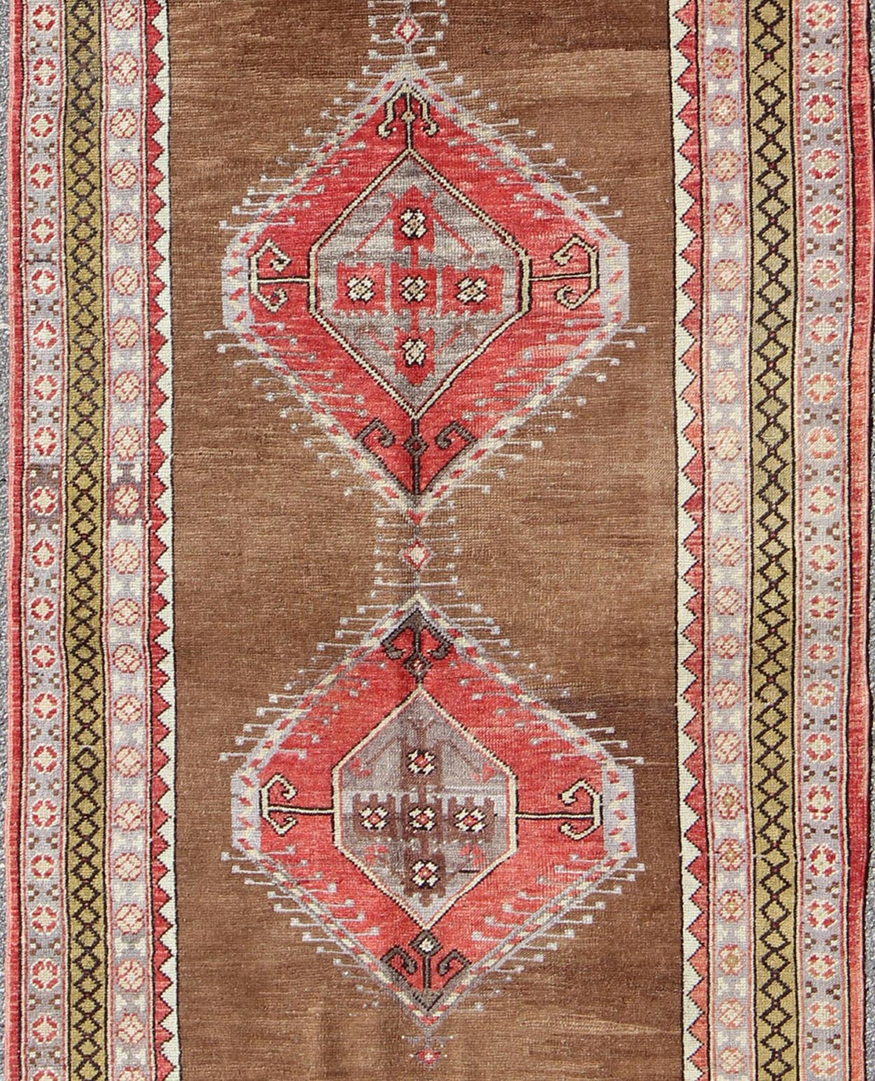 Vintage Turkish Oushak Rug with Three Large Medallions and Multiple Borders This beautiful vintage Oushak runner from mid - 20th century Turkey features a Classic Oushak design, which is enhanced by its lustrous wool. The faint brown ground is hom... - Keivan Woven ArtsTU - TRS - 3432 - 5920Rug