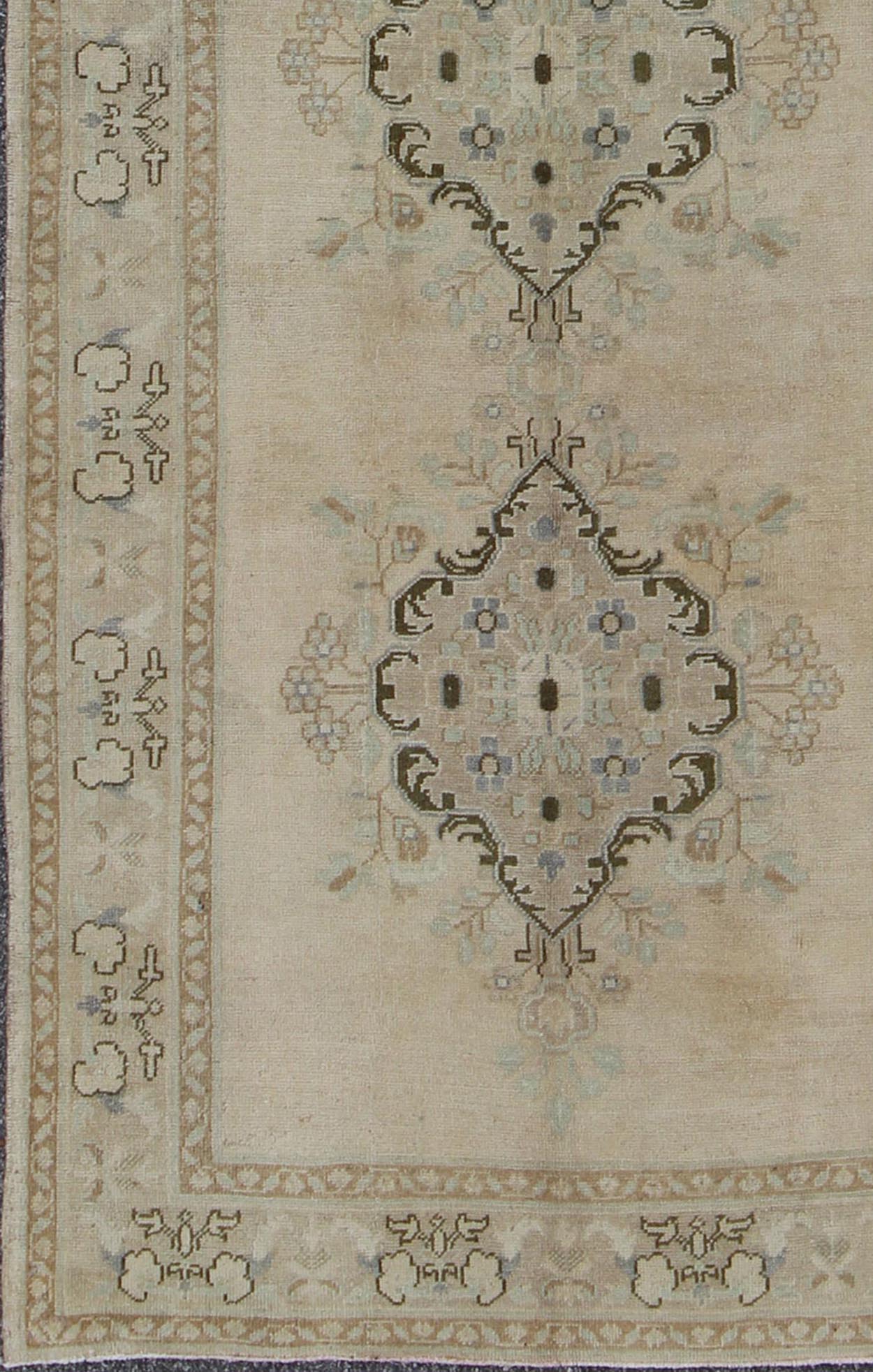 Vintage Turkish Oushak Rug with Three Central Medallions in Taupe, Ivory & Gray kwarugs Oushak Vintage Turkish Rug with Three Central Medallions rug/ tu - trs - 3436 origin/ turkey This vintage Oushak beautifully illustrates the impressive cr... - Keivan Woven ArtsTU - TRS - 3436 - 6207Rug
