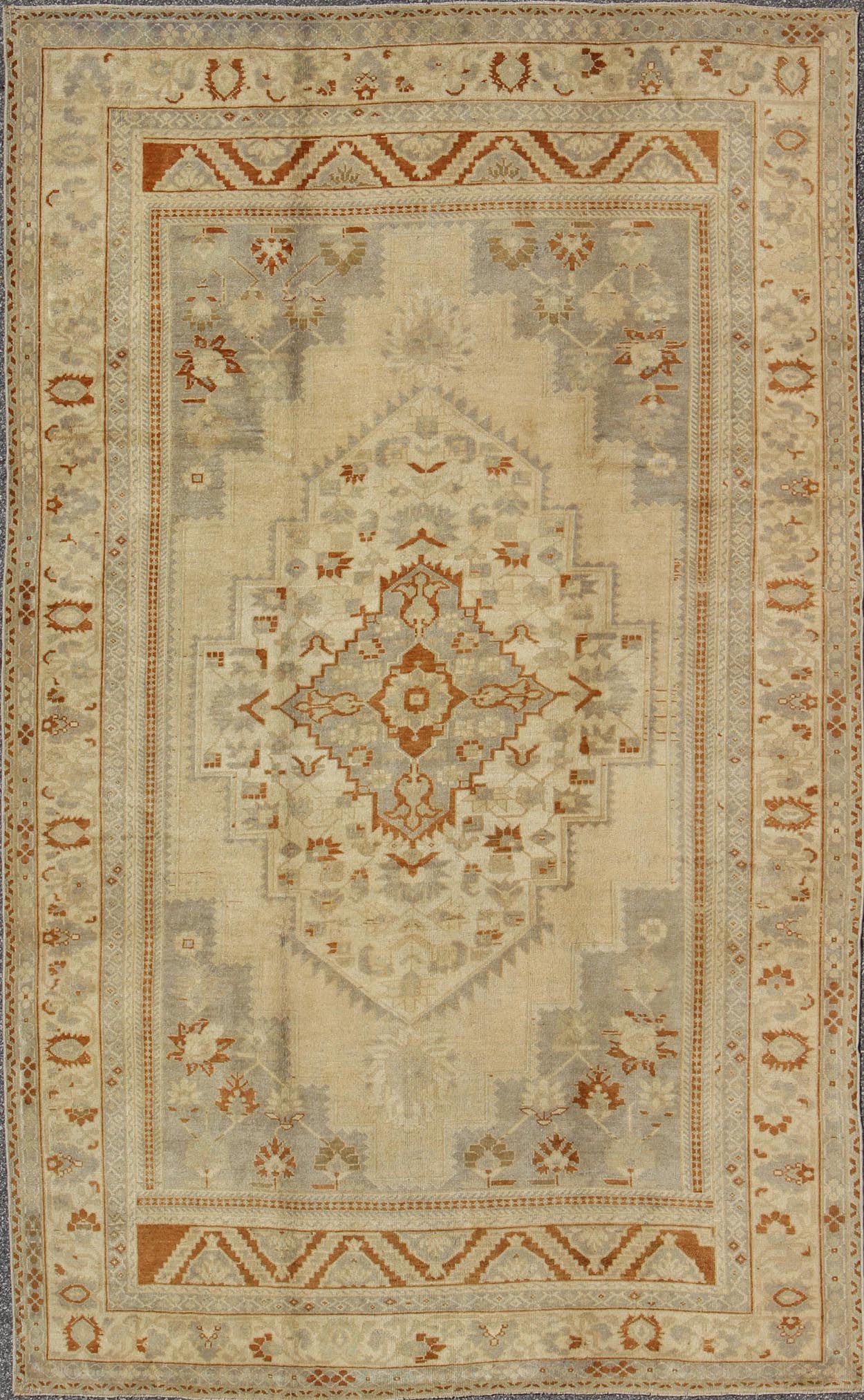 Floral Layered Medallion Vintage Turkish Oushak Rug in Cream, Ivory, Gray & Brown Measures: 6'10'' x 11'3''. This Oushak carpet (circa mid - 20th century) features a multi - layered medallion framed in the central field. Complementary floral desi... - Keivan Woven ArtsTU - TRS - 3619 - 7255Rug
