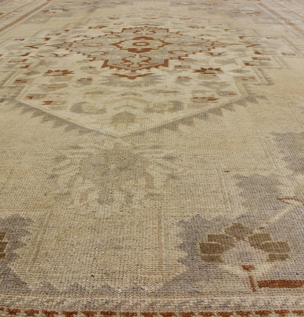 Floral Layered Medallion Vintage Turkish Oushak Rug in Cream, Ivory, Gray & Brown Measures: 6'10'' x 11'3''. This Oushak carpet (circa mid - 20th century) features a multi - layered medallion framed in the central field. Complementary floral desi... - Keivan Woven ArtsTU - TRS - 3619 - 7255Rug