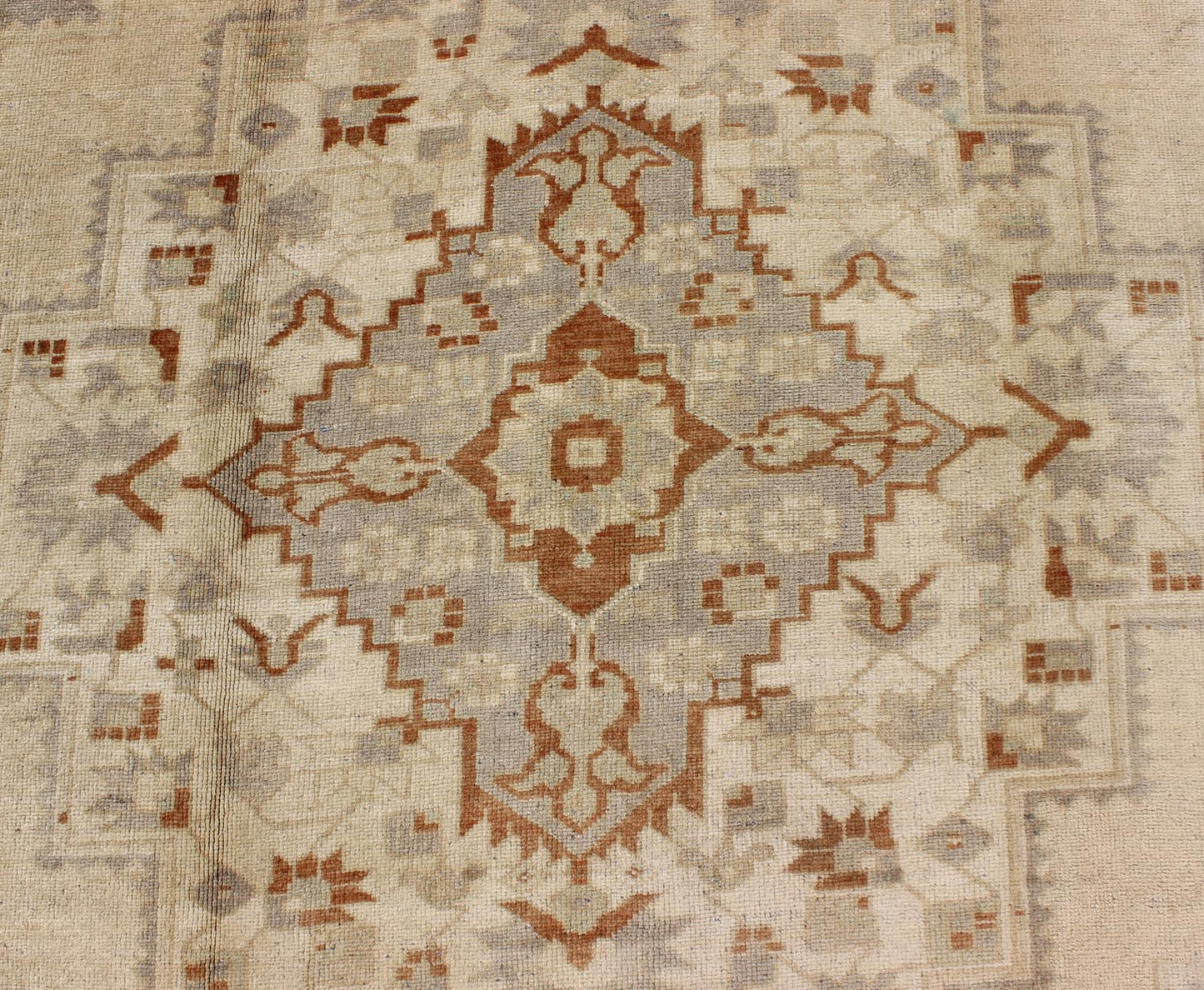 Floral Layered Medallion Vintage Turkish Oushak Rug in Cream, Ivory, Gray & Brown Measures: 6'10'' x 11'3''. This Oushak carpet (circa mid - 20th century) features a multi - layered medallion framed in the central field. Complementary floral desi... - Keivan Woven ArtsTU - TRS - 3619 - 7255Rug